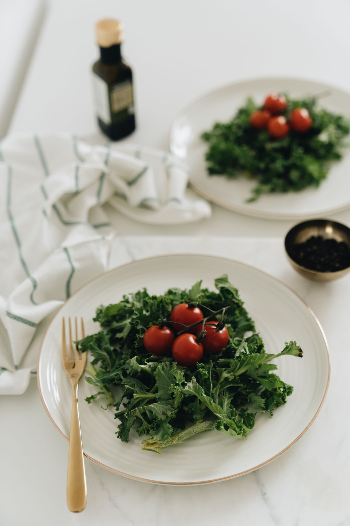 Chopped Kale Plates with Cherry Tomatoes