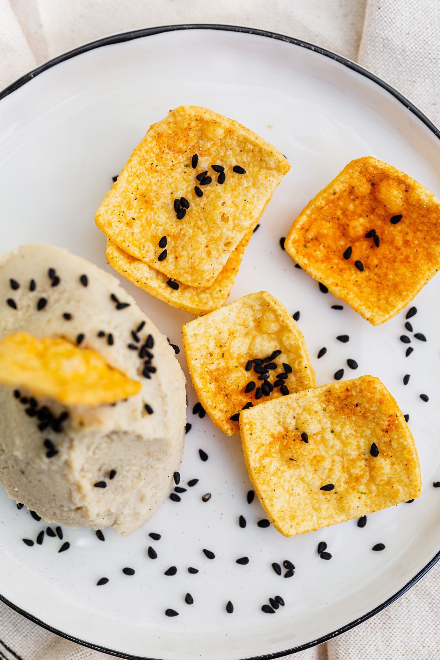 Golden Nigella Seed Crackers with Cashew Cheese